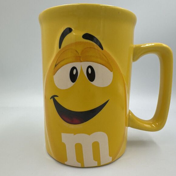 M&M’s Yellow Mug 3D Character Face Raised Letters 2012 Mars Ceramic Coffee Cup - Picture 1 of 4